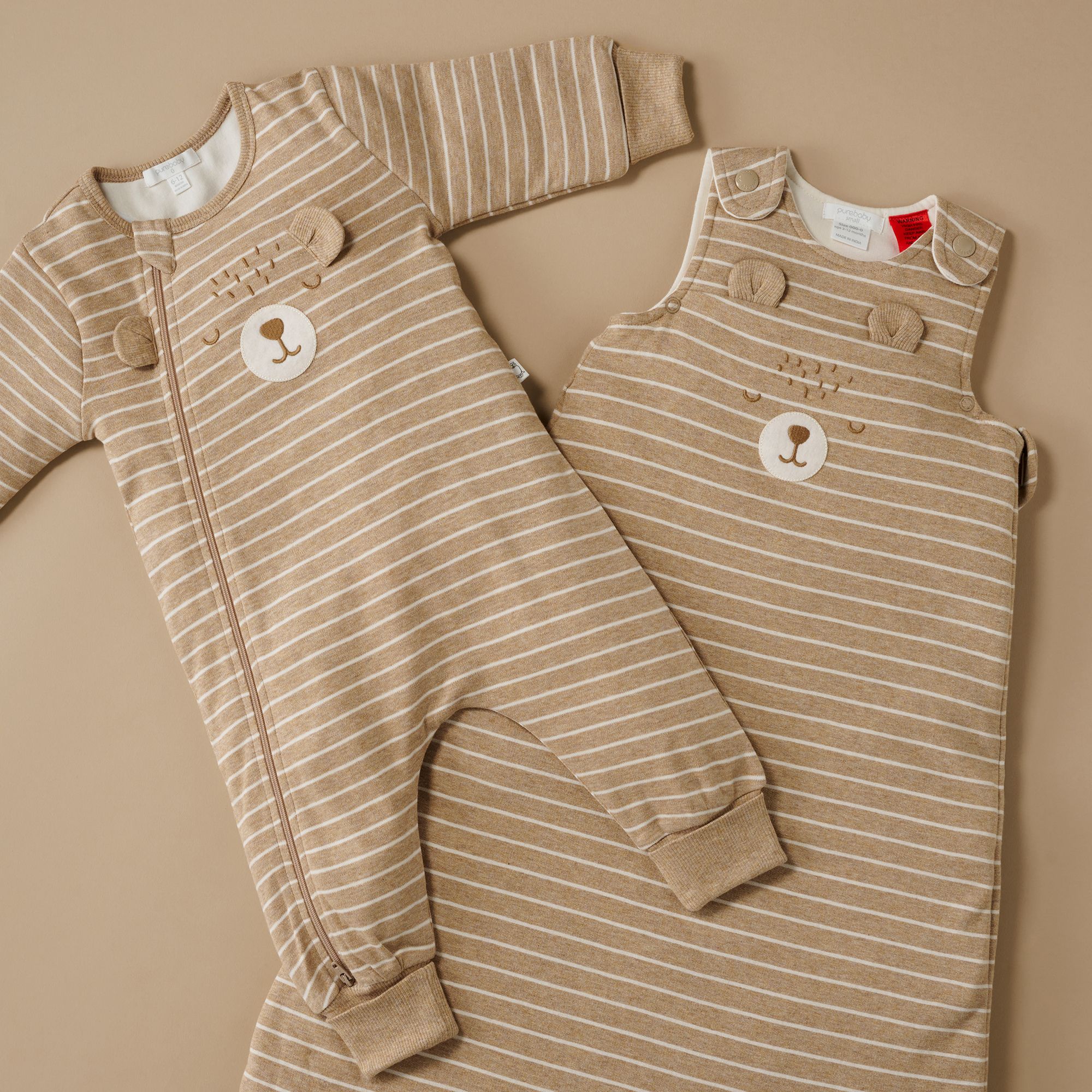 Purebaby sleeping bag and growsuit